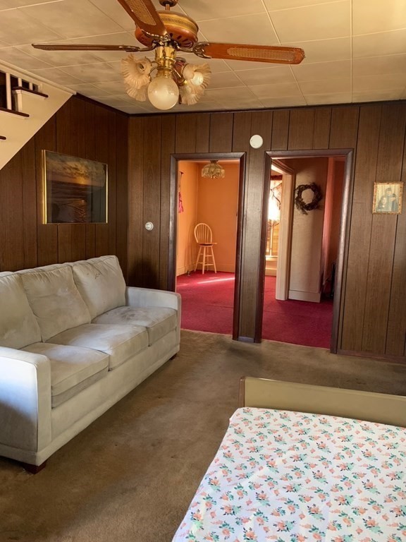 29 May Street Spencer, MA 01562 - Photo 3 of 27 a living room with furniture and wooden floor