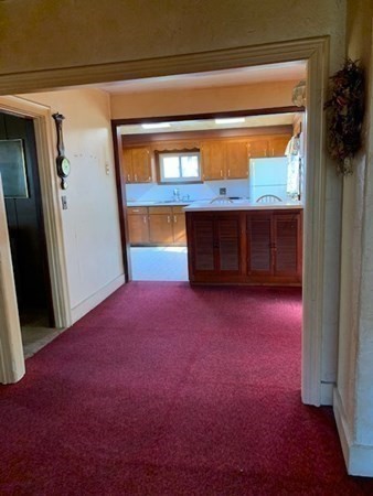 29 May Street Spencer, MA 01562 - Photo 10 of 27 a view of empty room with front door