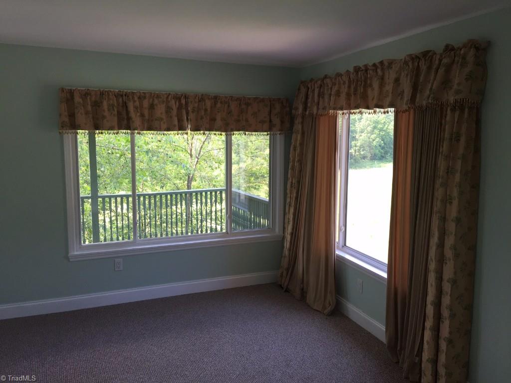 1231 Krishna Road Sandy Ridge, NC 27046 - Photo 22 of 28 Upstairs Bathroom with its own deck. View are gorgeous