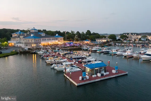 a view of a swimming pool with lake view and mountain view