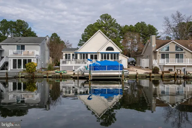 a balcony with furniture and city view