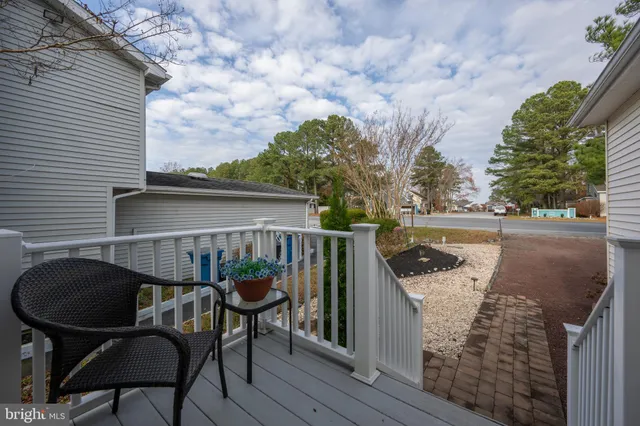 a view of balcony with furniture and outdoor seating