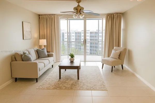 a living room with furniture and a window