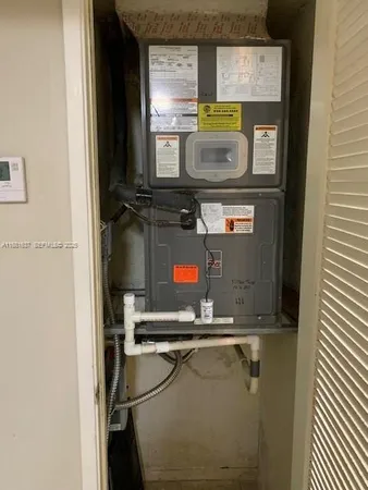 a room with storage and utility