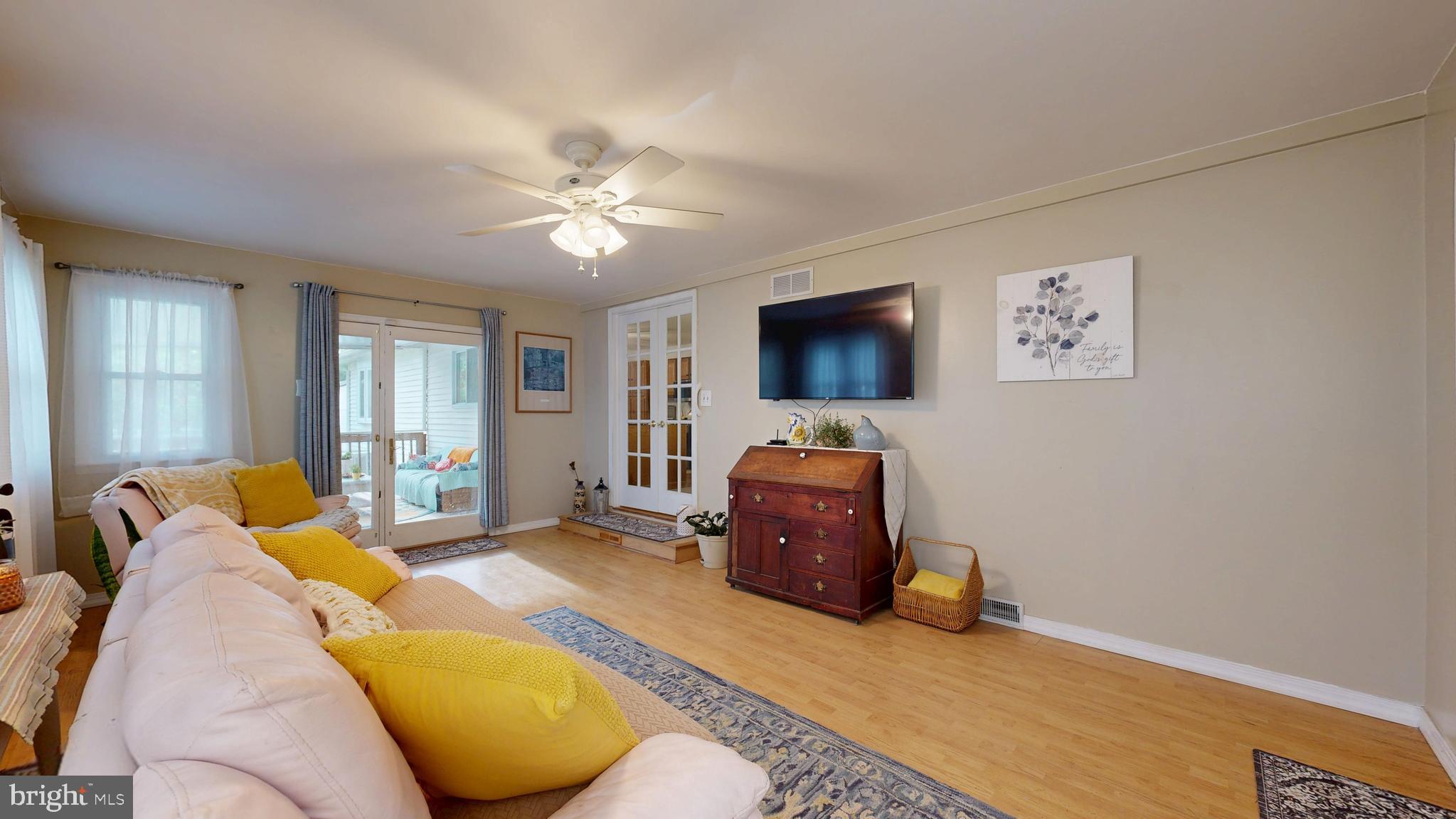705 Deer Track Lane Dover, DE 19904 - Photo 18 of 29 a bedroom with furniture and a flat screen tv