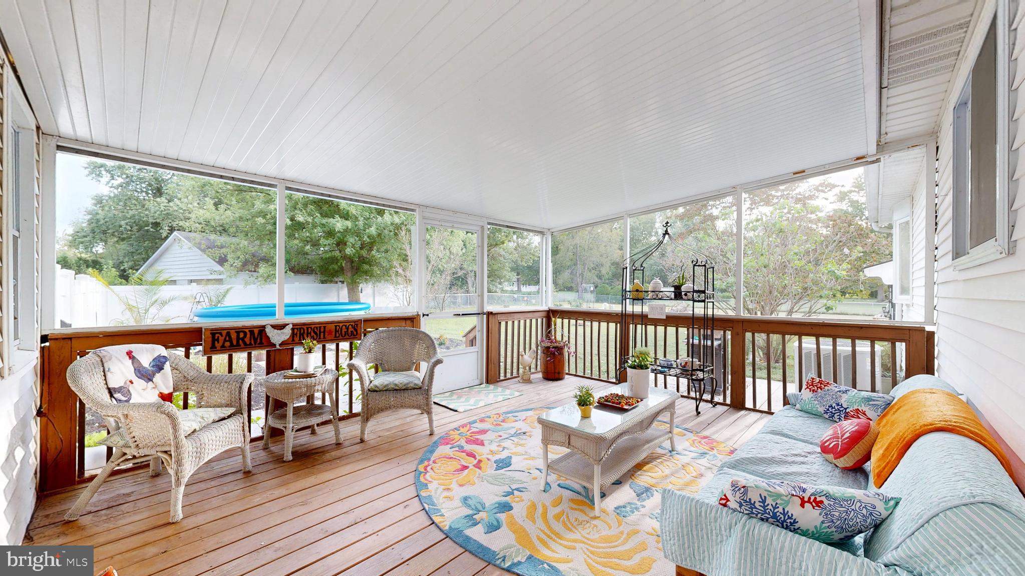 705 Deer Track Lane Dover, DE 19904 - Photo 28 of 29 a balcony view with a seating space