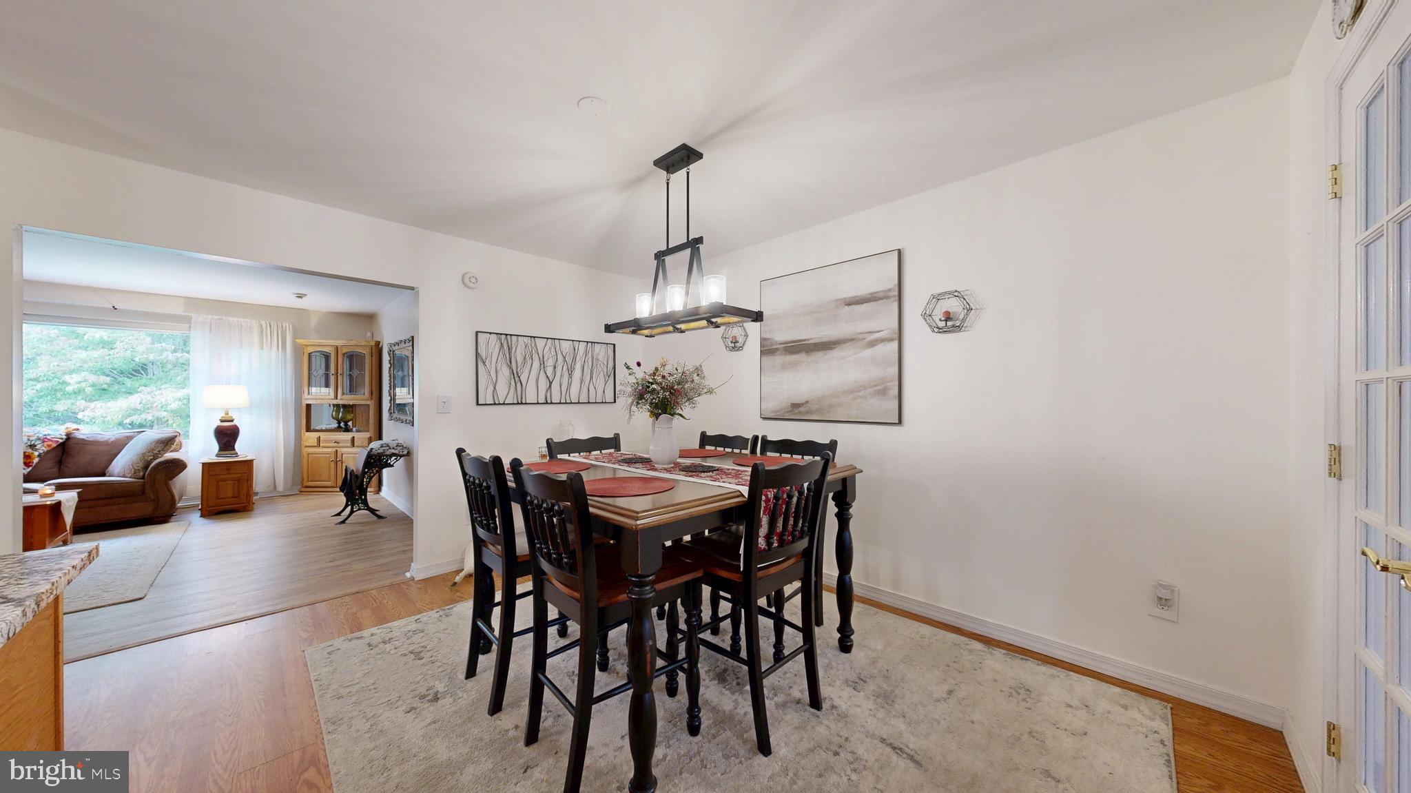 705 Deer Track Lane Dover, DE 19904 - Photo 10 of 29 a view of a dining room with furniture