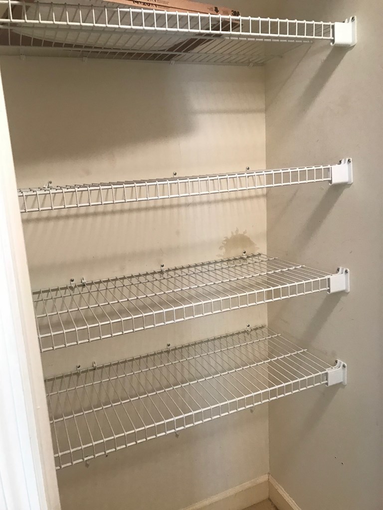 5931 Huddersfield Road Macon, GA 31210 - Photo 12 of 28 a view of a room with racks on the wall