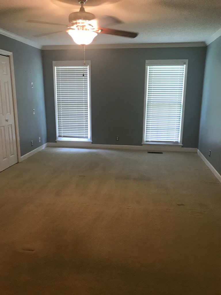 5931 Huddersfield Road Macon, GA 31210 - Photo 13 of 28 a view of an empty room with a window