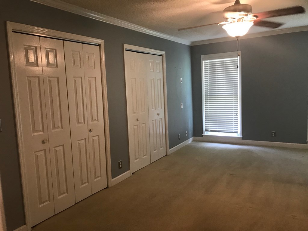 5931 Huddersfield Road Macon, GA 31210 - Photo 14 of 28 a view of a livingroom with a chandelier fan