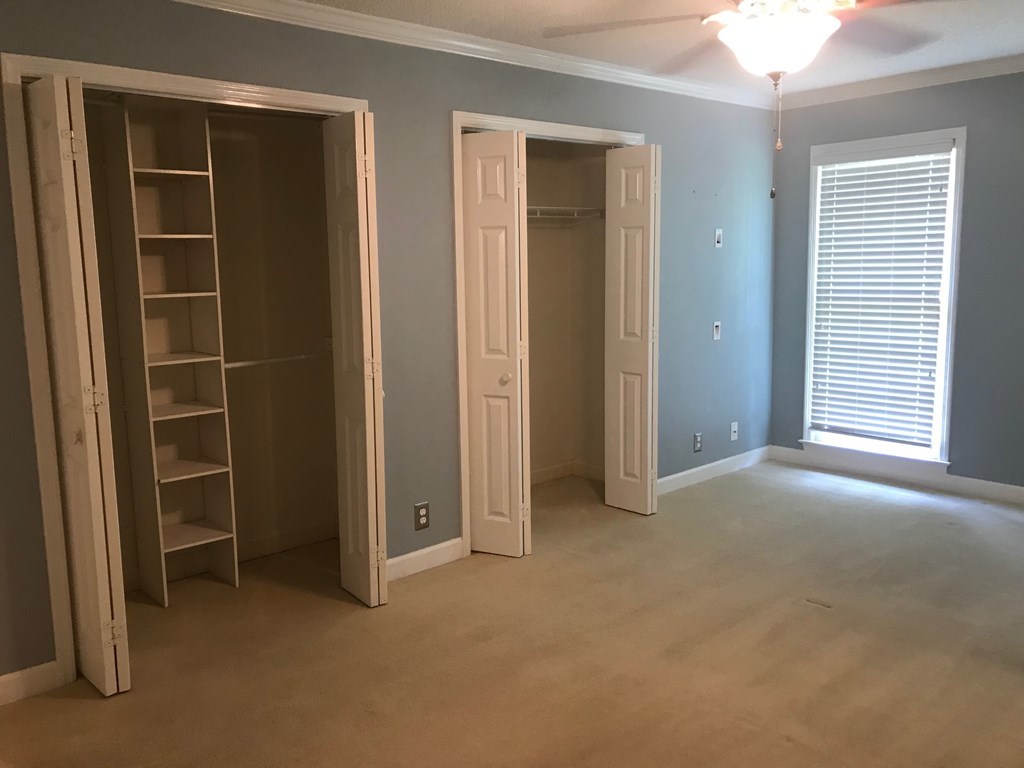 5931 Huddersfield Road Macon, GA 31210 - Photo 15 of 28 an empty room with closet and a window