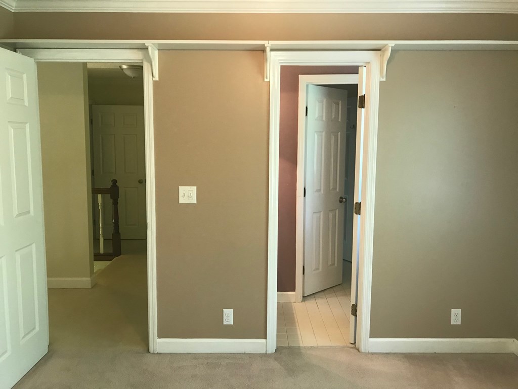 5931 Huddersfield Road Macon, GA 31210 - Photo 22 of 28 a view of a bathroom with a glass door