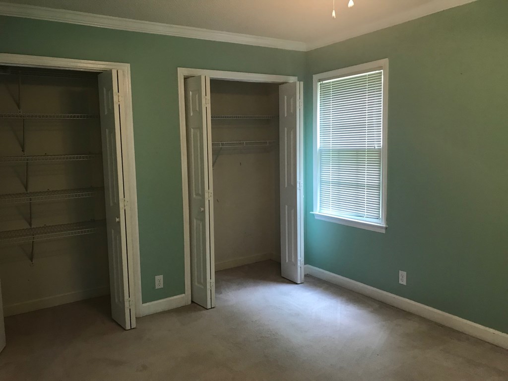 5931 Huddersfield Road Macon, GA 31210 - Photo 24 of 28 an empty room with windows