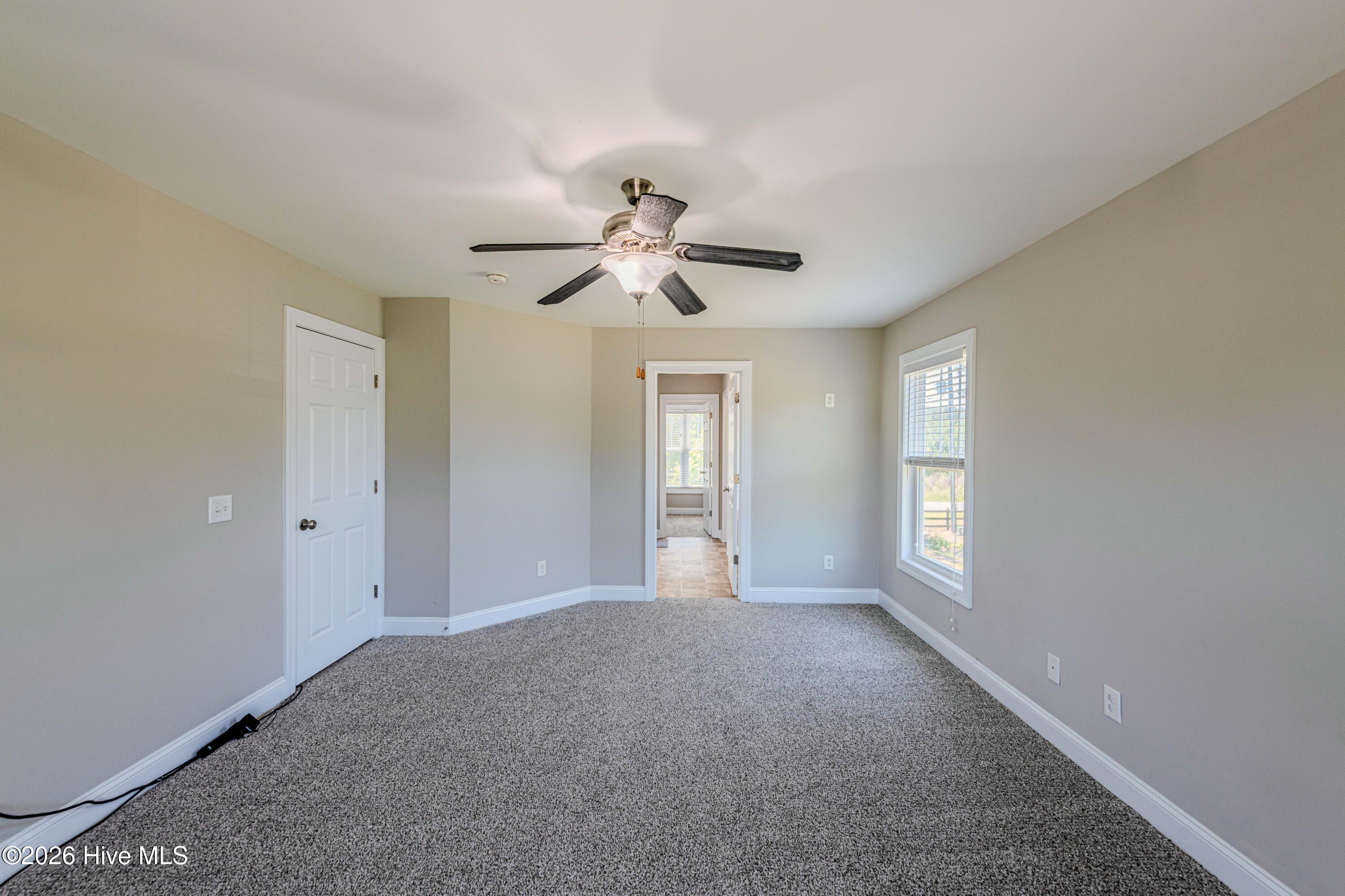 673 Morris Landing Road Holly Ridge, NC 28445 - Photo 74 of 125 Primary bedroom