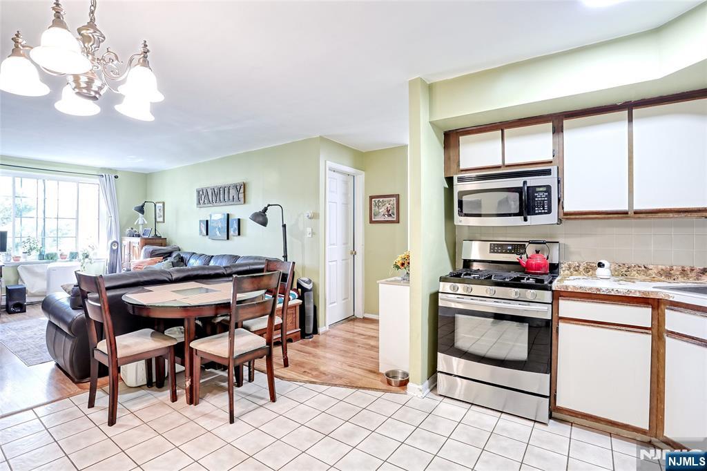 2009 Hawthorne Lane Mahwah, NJ 07430 - Photo 12 of 31 a kitchen that has a table and chair in it