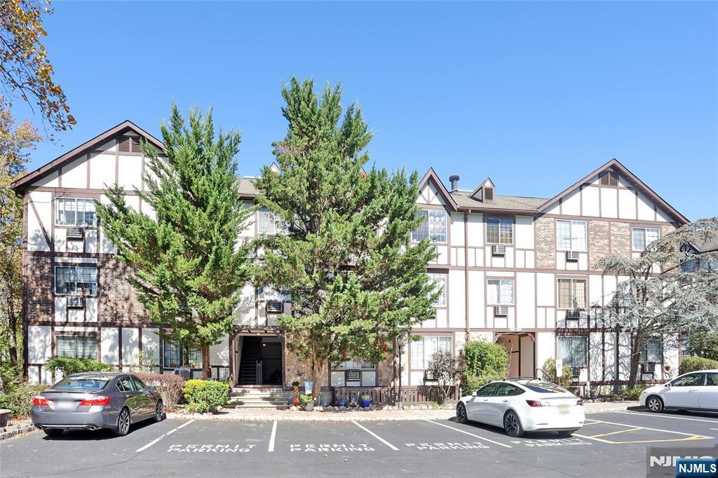 2009 Hawthorne Lane Mahwah, NJ 07430 - Photo 23 of 31 a view of a cars park in front of a building