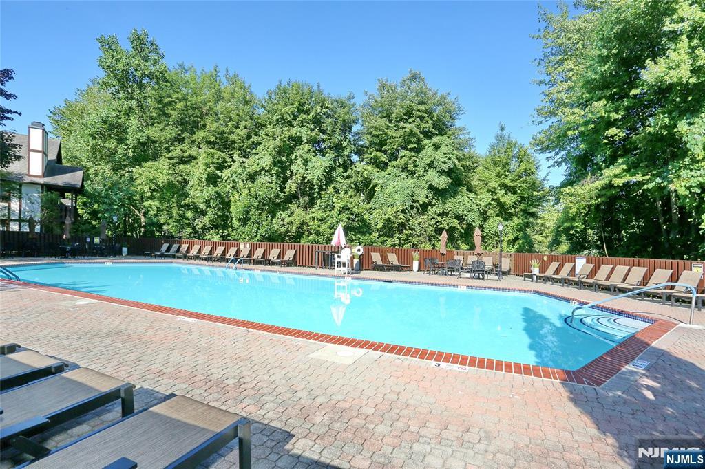 2009 Hawthorne Lane Mahwah, NJ 07430 - Photo 30 of 31 a view of a swimming pool with an outdoor seating