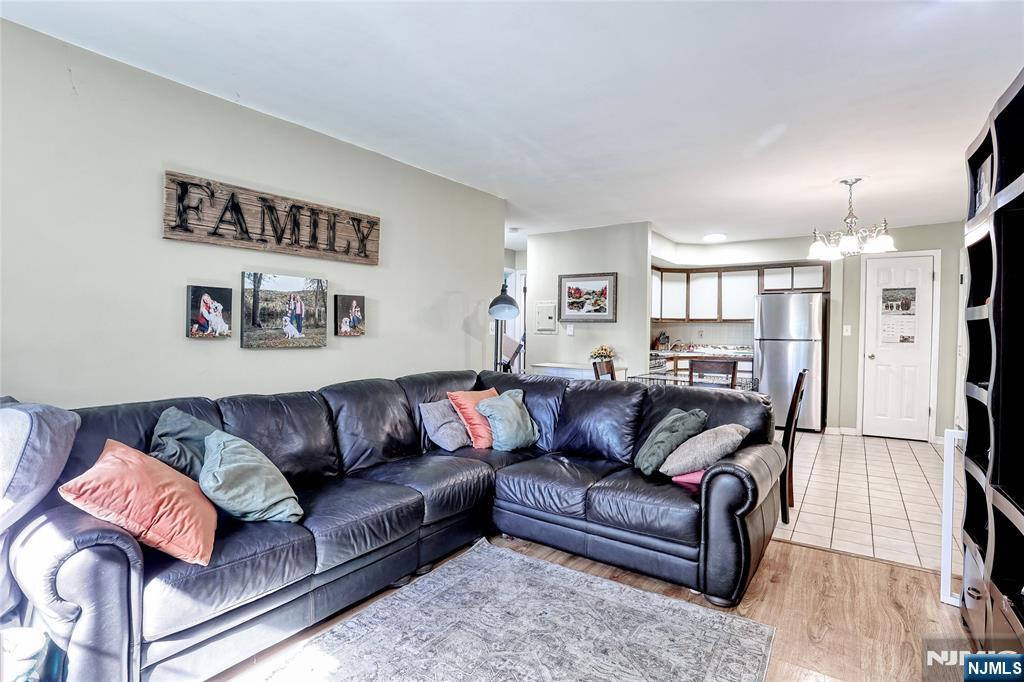 2009 Hawthorne Lane Mahwah, NJ 07430 - Photo 8 of 31 a living room with furniture and a rug