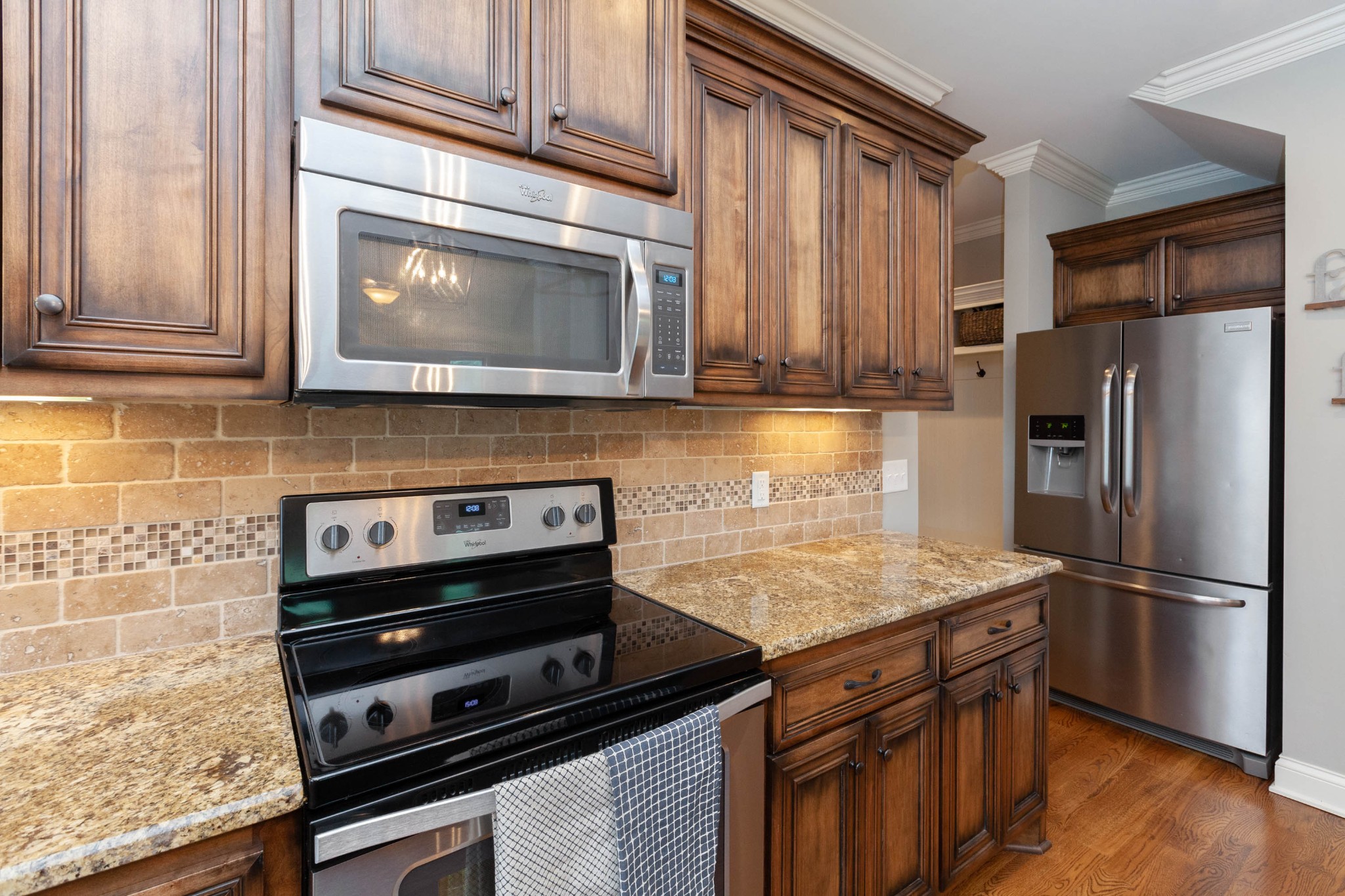 2648 Double Log Cabin Road Lebanon, TN 37087 - Photo 11 of 42 a kitchen with appliances cabinets and a counter top space