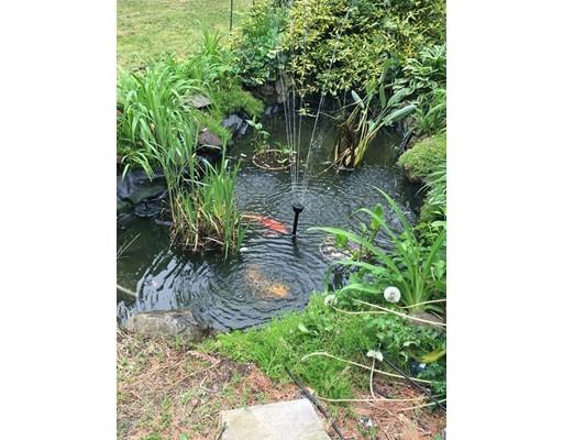 7 13th Avenue Wareham, MA 02571 - Photo 21 of 22 a backyard of a house with lots of green space