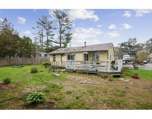 7 13th Avenue Wareham, MA 02571 - Photo 22 of 22 a backyard of a house with table and chairs
