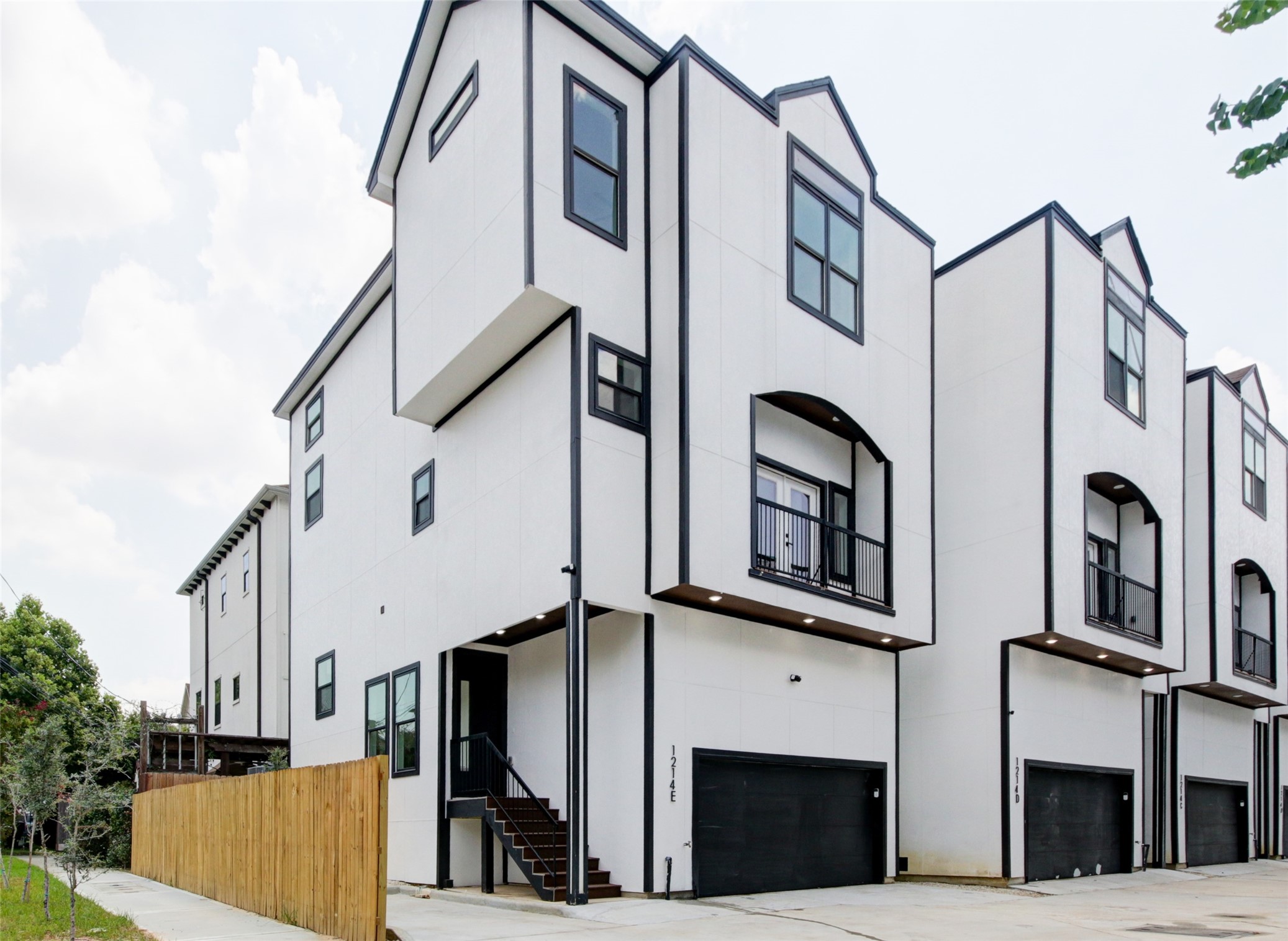 1214 West 24th Street, Unit D Houston, TX 77008 - Photo 2 of 45 a view of a building with a street