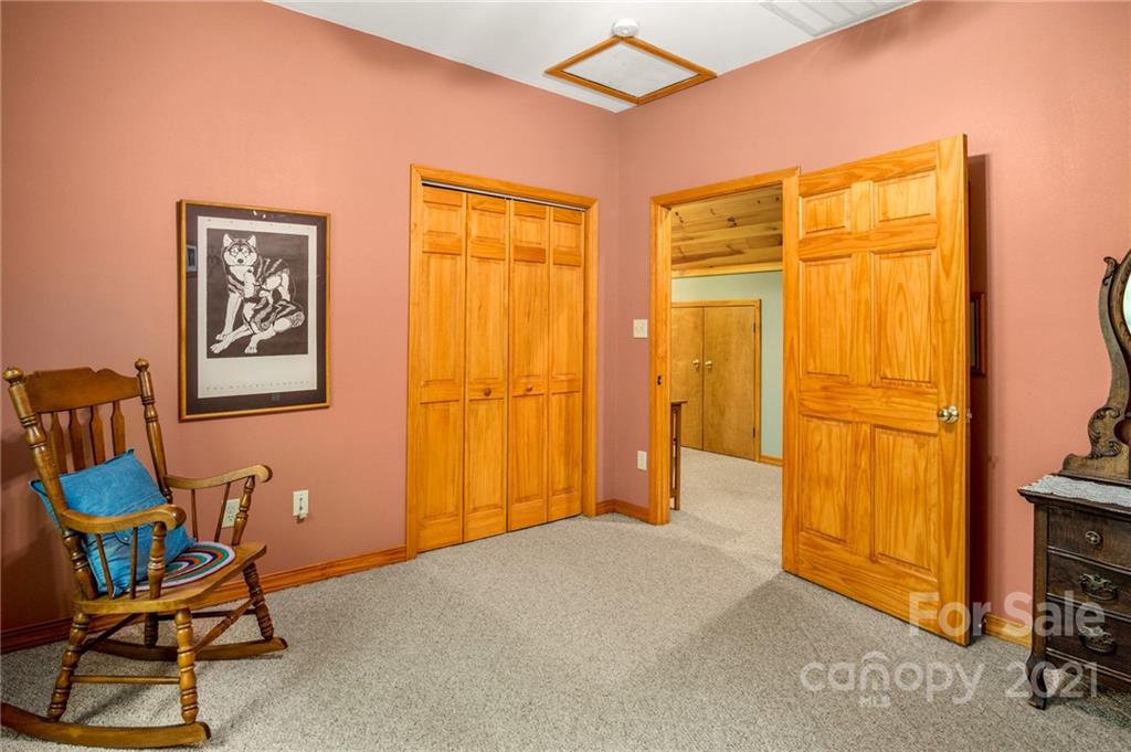 74 Apgar Road Candler, NC 28715 - Photo 19 of 46 a view of a livingroom with furniture and a window
