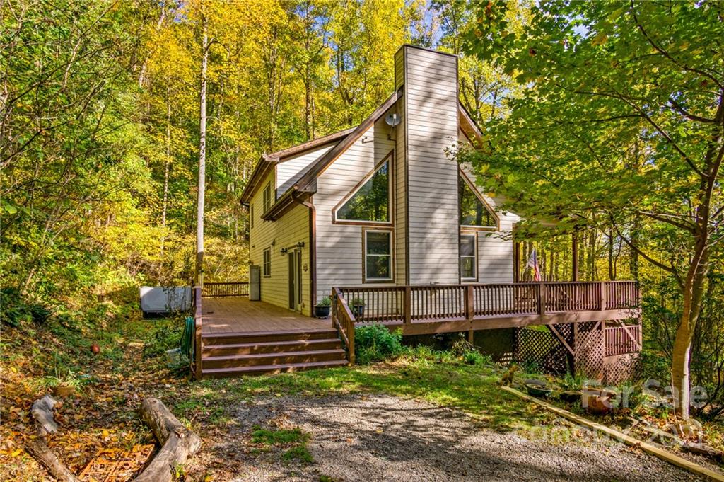 74 Apgar Road Candler, NC 28715 - Photo 2 of 46 a view of a house with a small yard