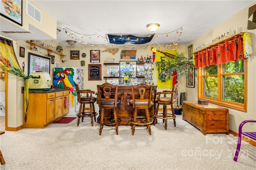 74 Apgar Road Candler, NC 28715 - Photo 25 of 46 a group of people sitting in a room