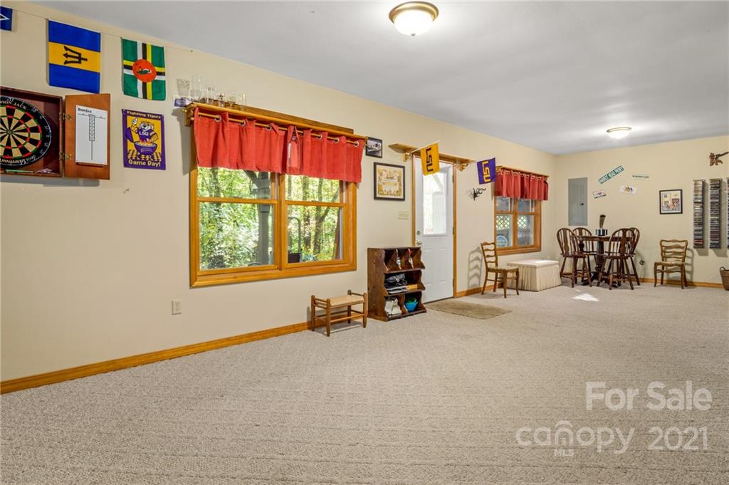 74 Apgar Road Candler, NC 28715 - Photo 27 of 46 a view of a room with gym equipment