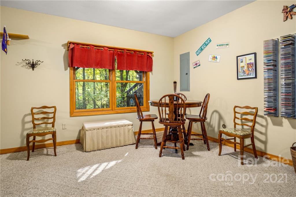 74 Apgar Road Candler, NC 28715 - Photo 28 of 46 a view of a livingroom with furniture and a window