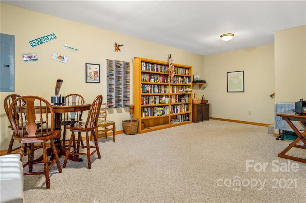 74 Apgar Road Candler, NC 28715 - Photo 30 of 46 a view of a livingroom with furniture and staircase