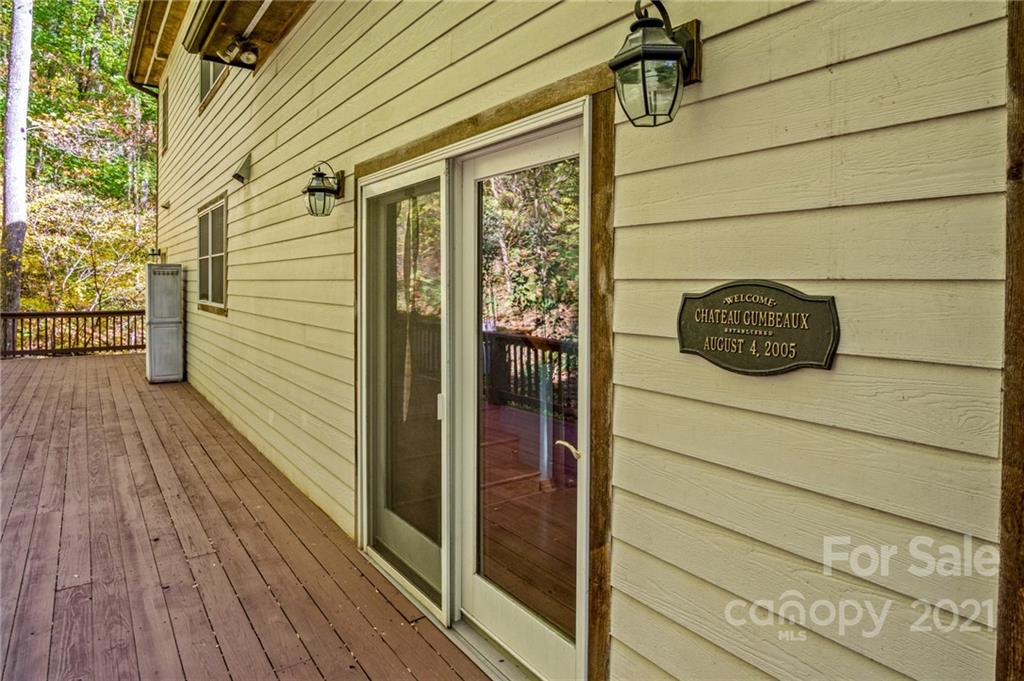 74 Apgar Road Candler, NC 28715 - Photo 32 of 46 a view of a door and wooden floor