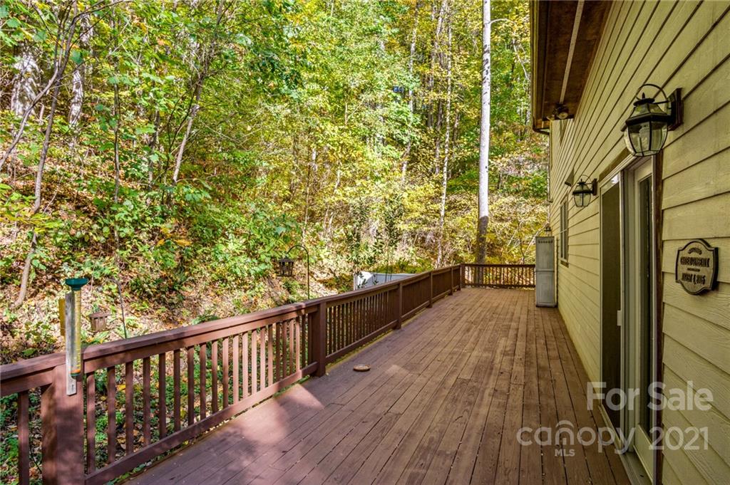 74 Apgar Road Candler, NC 28715 - Photo 33 of 46 a view of balcony with wooden floor