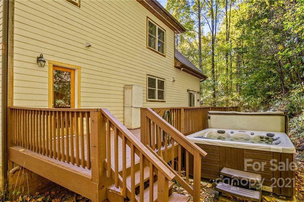 74 Apgar Road Candler, NC 28715 - Photo 36 of 46 a view of a balcony with furniture