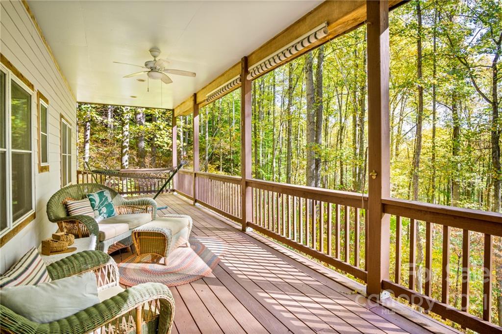 74 Apgar Road Candler, NC 28715 - Photo 39 of 46 a living room with large windows and furniture