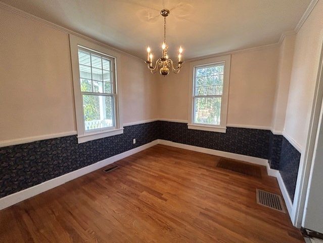 a kitchen that has a sink and a stove