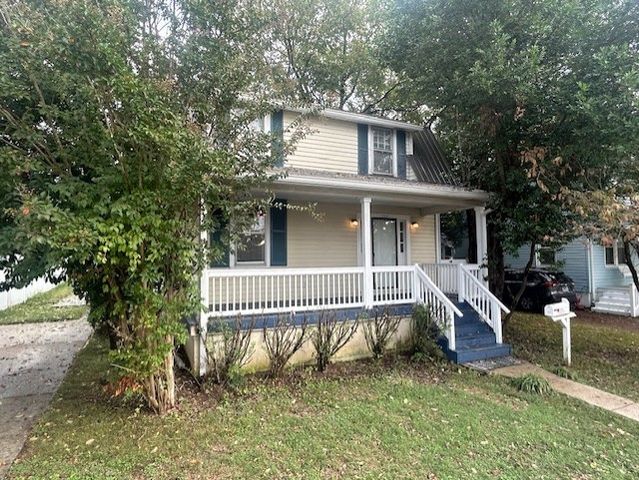 a view of a wooden deck with a bench