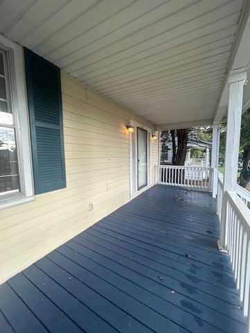 a view of livingroom with hardwood floor and window