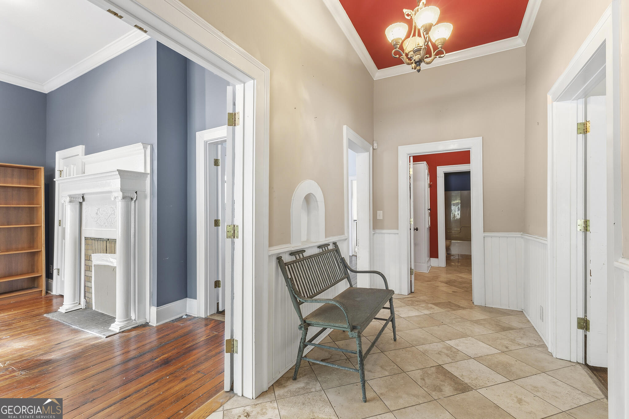 1469 Chestnut Street Macon, GA 31201 - Photo 6 of 26 a view of a hallway with wooden floor and chair