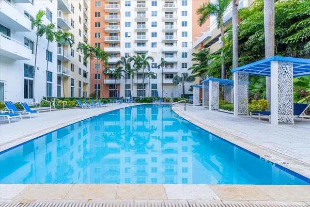 a view of a building with a garden