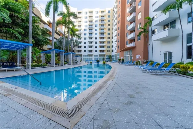 a view of a building with a street