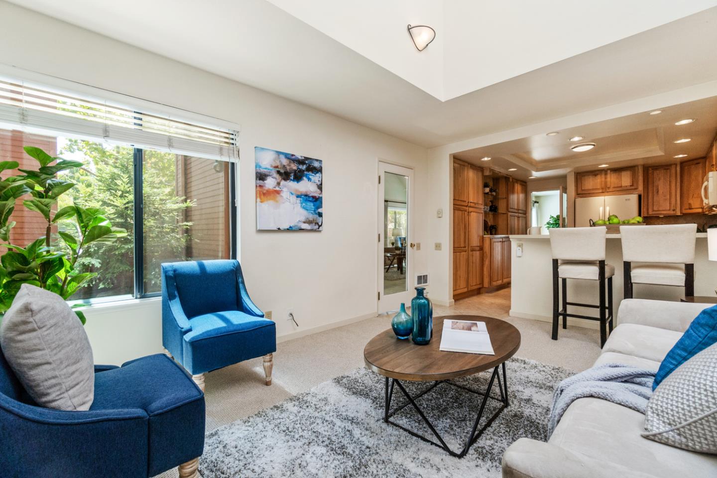 910 Wharfside Road San Mateo, CA 94404 - Photo 14 of 43 a living room with furniture and a large window