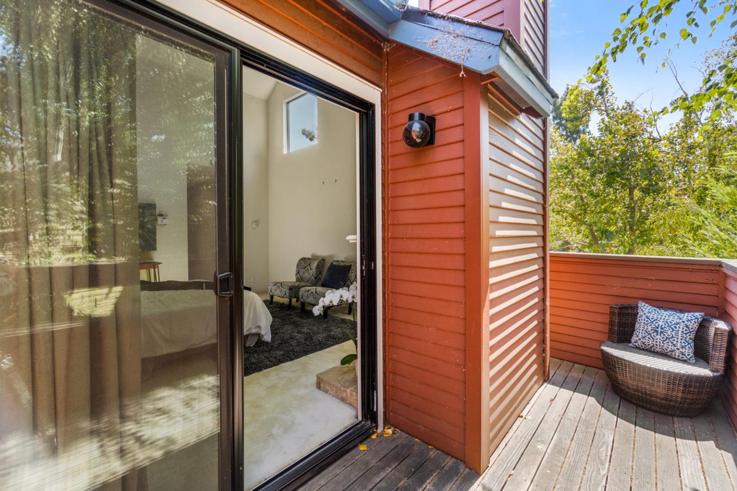 910 Wharfside Road San Mateo, CA 94404 - Photo 21 of 43 a balcony view with a glass door