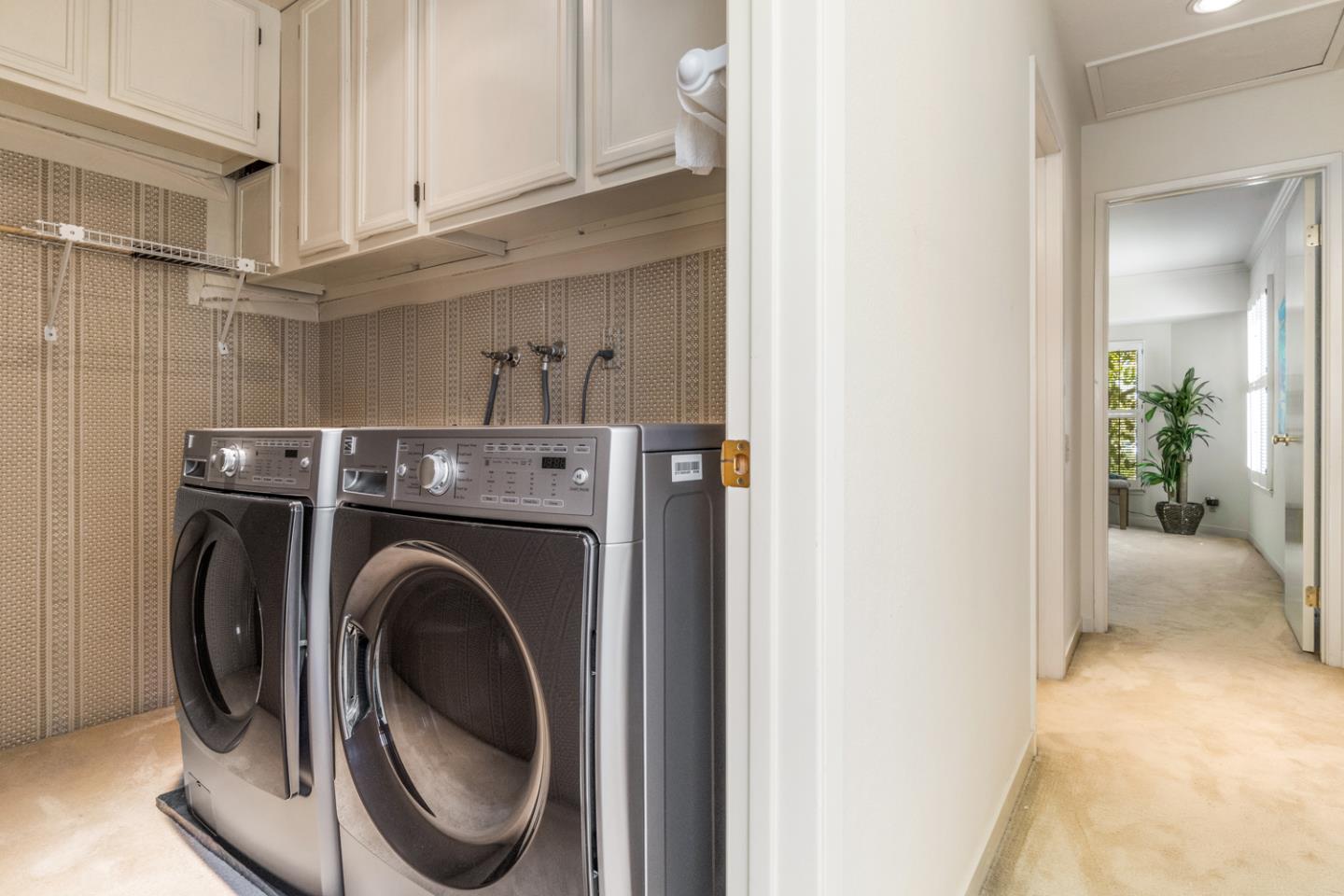910 Wharfside Road San Mateo, CA 94404 - Photo 25 of 43 a utility room with dryer and washer