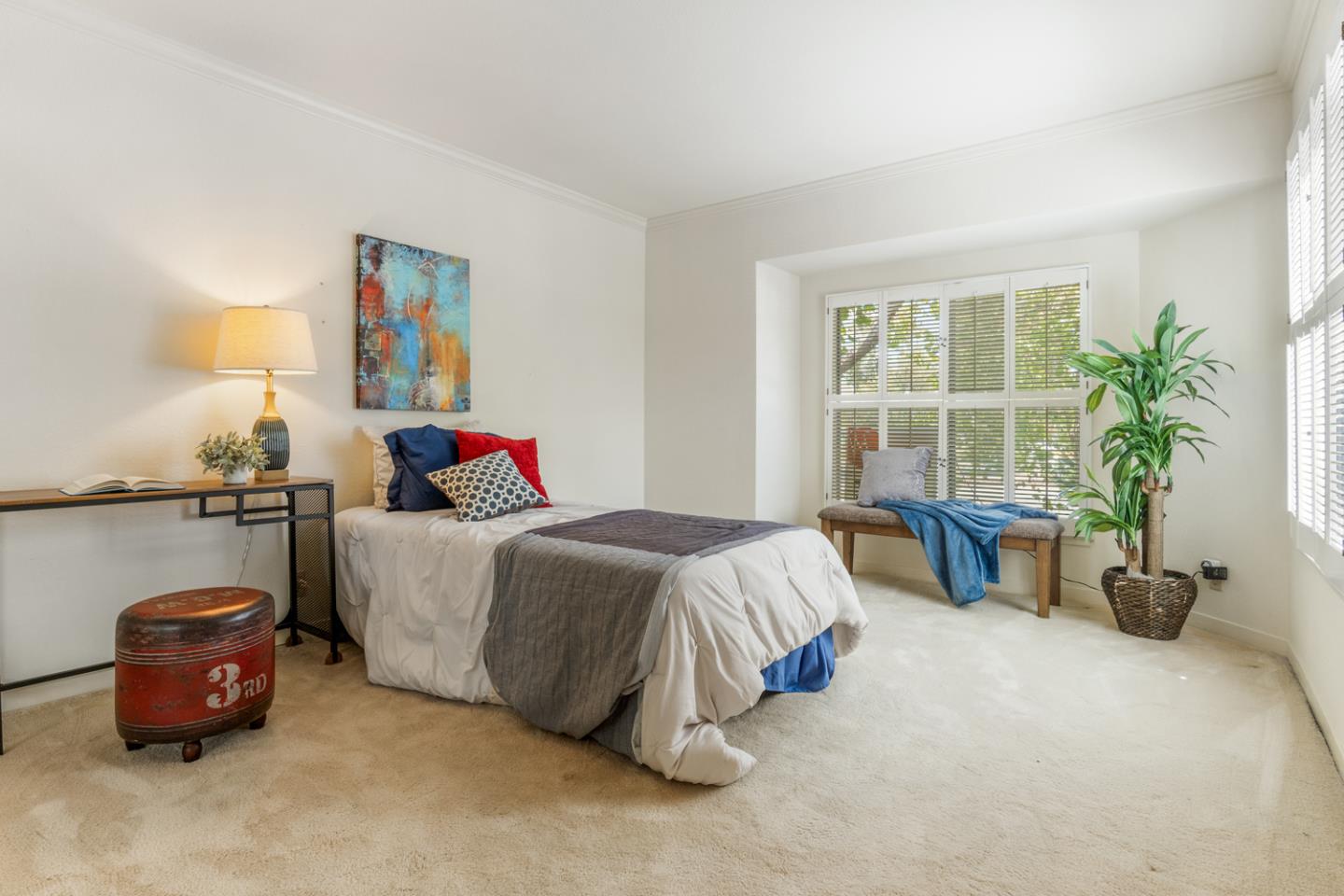 910 Wharfside Road San Mateo, CA 94404 - Photo 26 of 43 a bedroom with bed and table