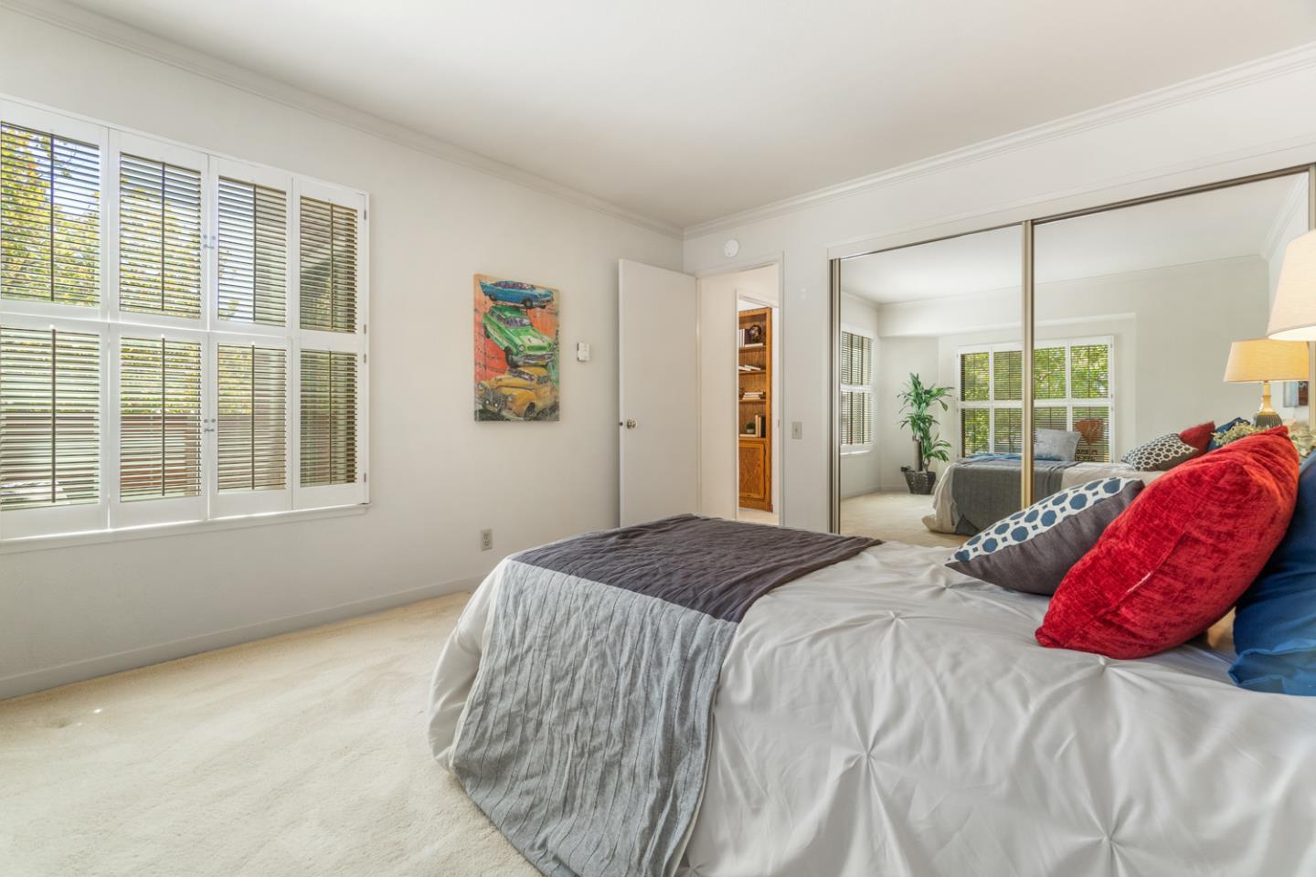 910 Wharfside Road San Mateo, CA 94404 - Photo 27 of 43 a bedroom with a bed and a large window