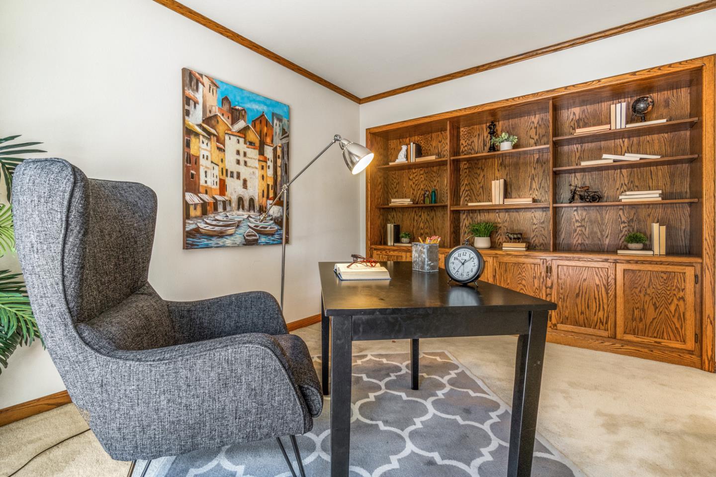 910 Wharfside Road San Mateo, CA 94404 - Photo 29 of 43 a living room with furniture a rug and white walls