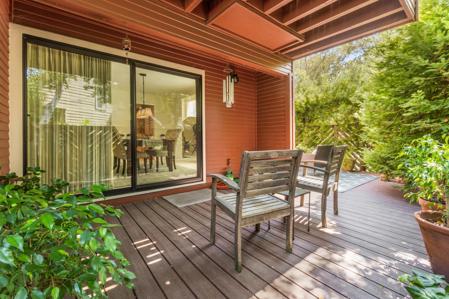 910 Wharfside Road San Mateo, CA 94404 - Photo 36 of 43 a balcony with chairs and with potted plants