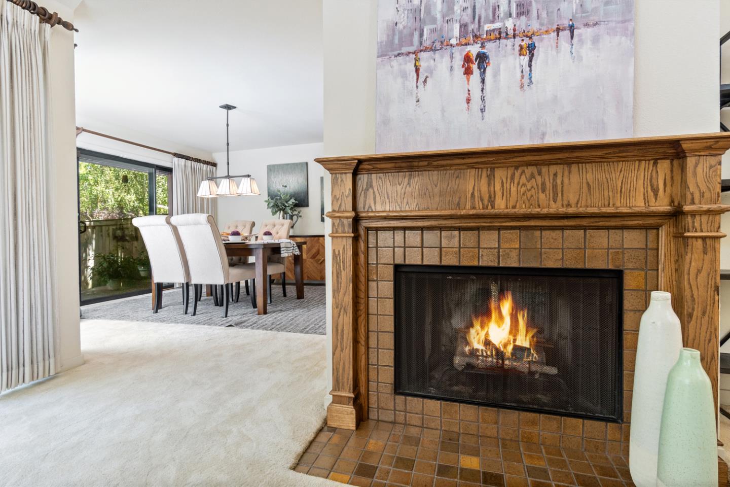 910 Wharfside Road San Mateo, CA 94404 - Photo 4 of 43 a living room with furniture and a fireplace